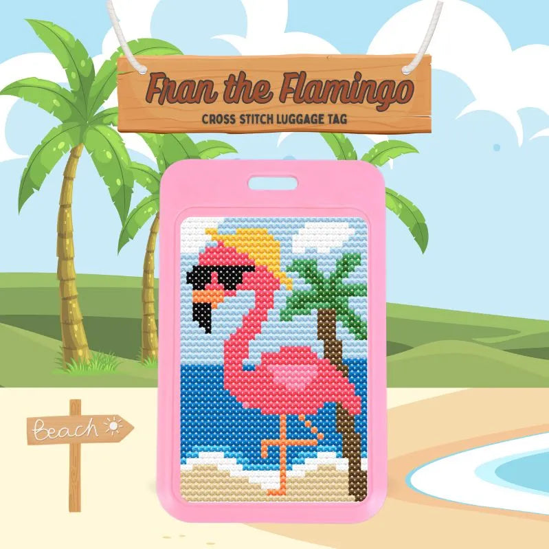 Finished cross stitch luggage tag made from a beginner stamped kit