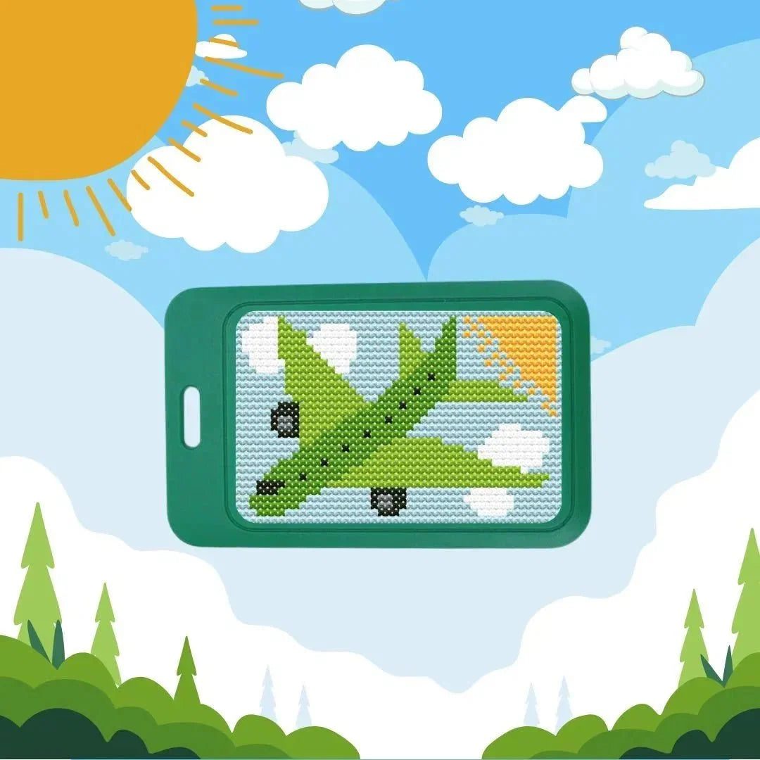 Green airplane cross stitch kit — an in-flight activity for travelers