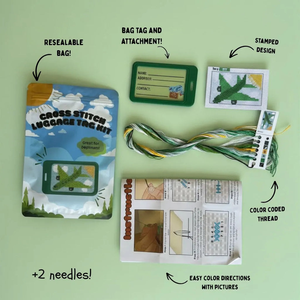 Green Airplane cross stitch luggage tag — completed beginner craft by Jumpseat Therapy