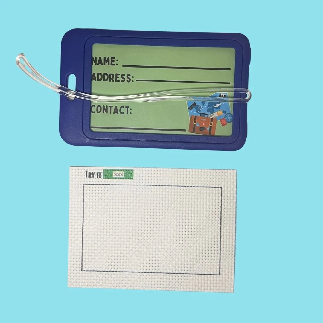 Luggage tag with14 CT AIDA fabric on a blue background
