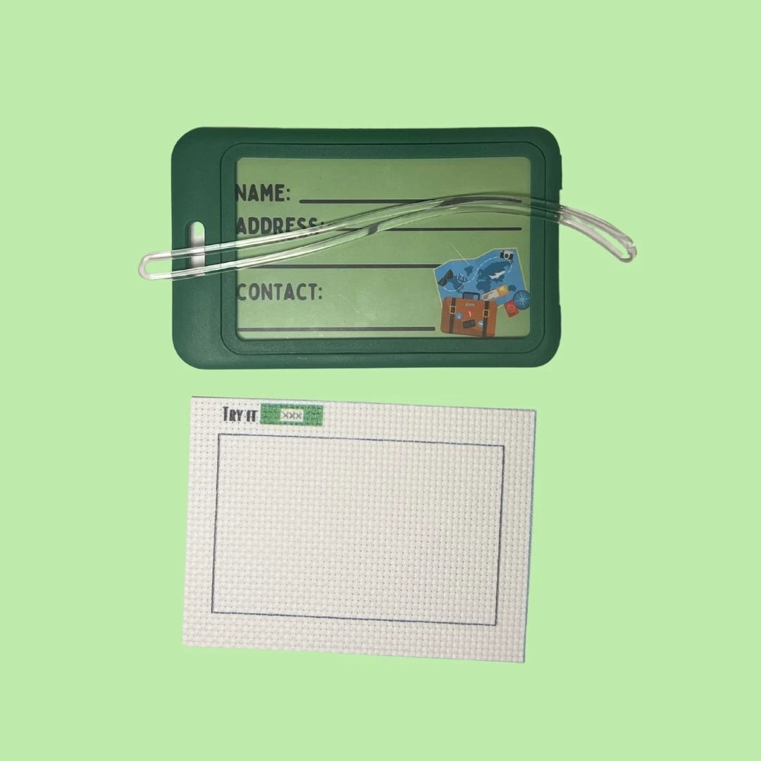 Green luggage tag with 14CT AIDA fabric on a light green background