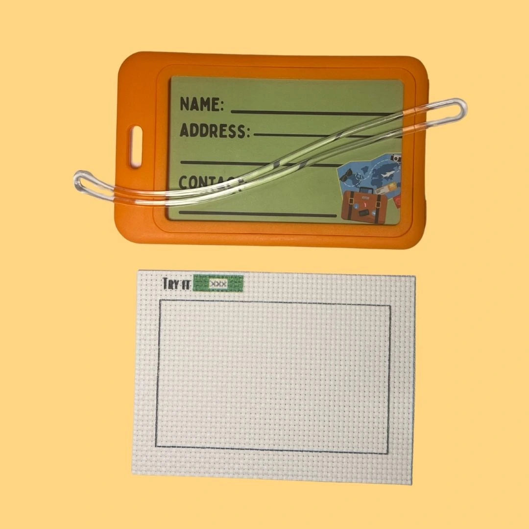 Orange luggage tag with a 14ct fabric on a yellow background