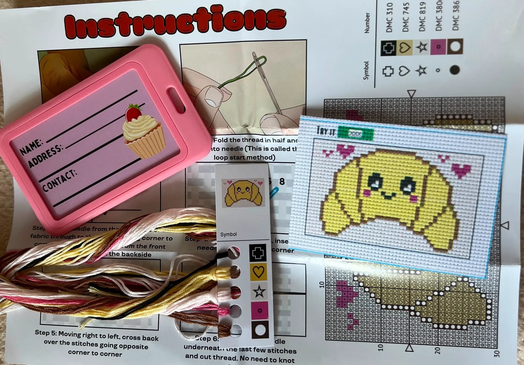 Casey the Croissant beginner cross stitch luggage tag kit by Jumpseat Therapy
