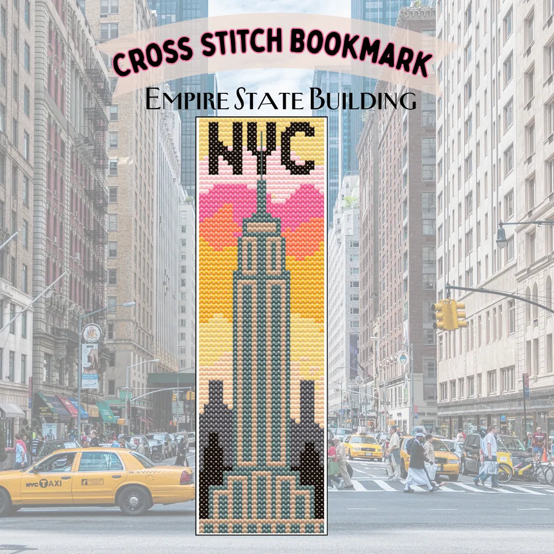 Cross stitch bookmark design of the Empire State Building with a cityscape background
