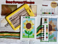 Cross-stitch kit with sunflower design, thread chart, and instruction sheet.