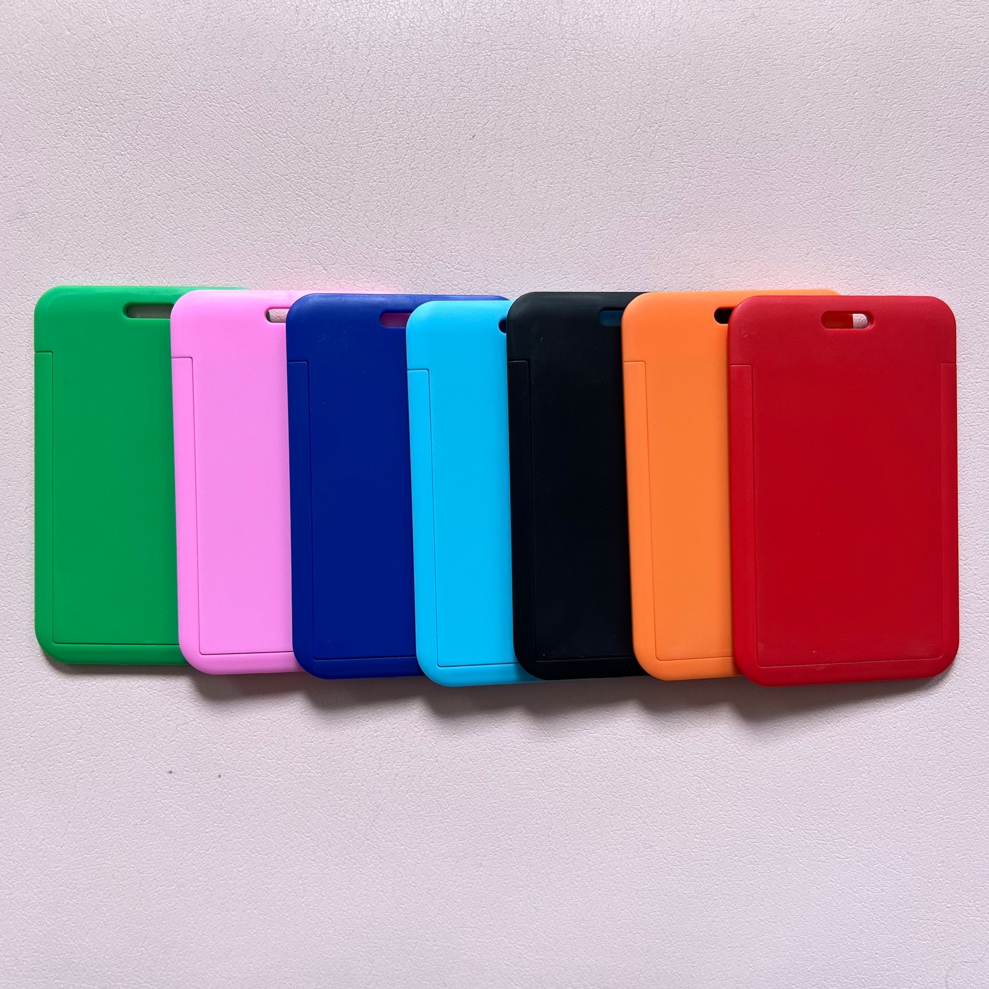 Green, Pink, Dark Blue, Light Blue, Black, Orange, and red luggage tags